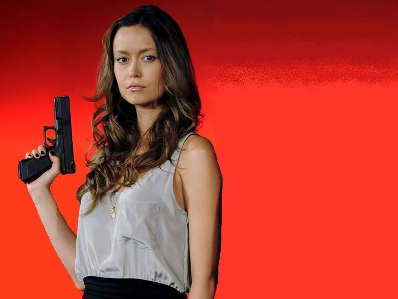 Woman Holding Gun — Red, Dramatic, Photograph