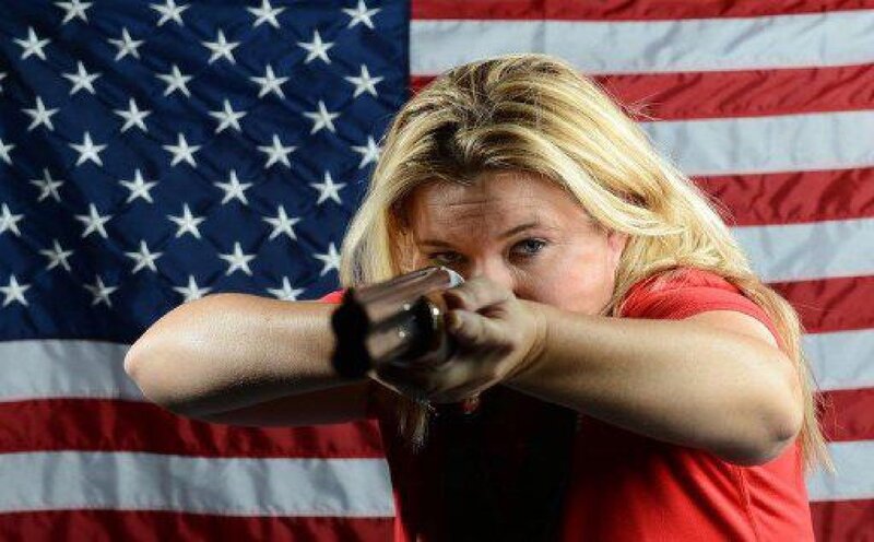 Woman Holding Gun — Red, Intense