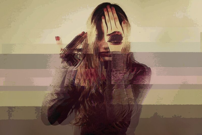 Woman Holding Gun to Head — Brown