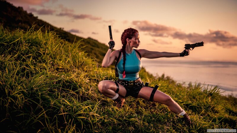 Woman Holding Guns — Green, Dramatic, Sunset