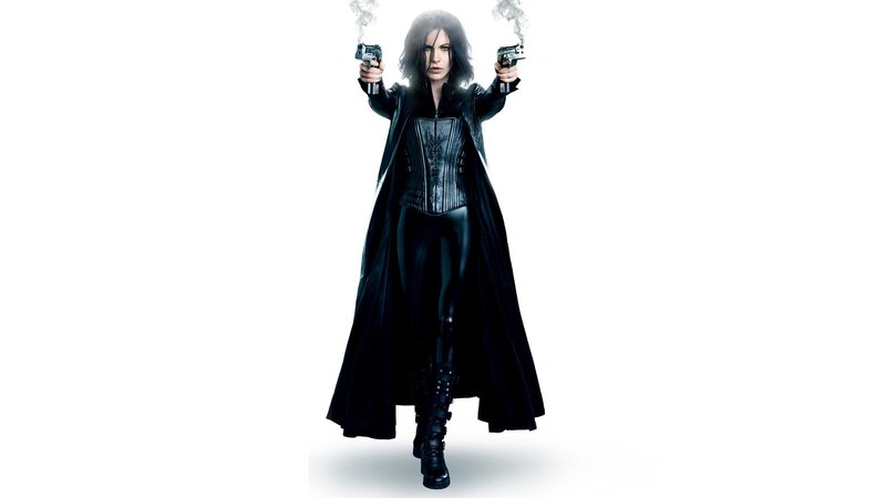 Woman Holding Guns — Photograph