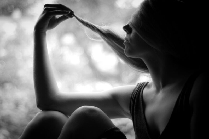 Woman Holding Hair — Black, Contemplative