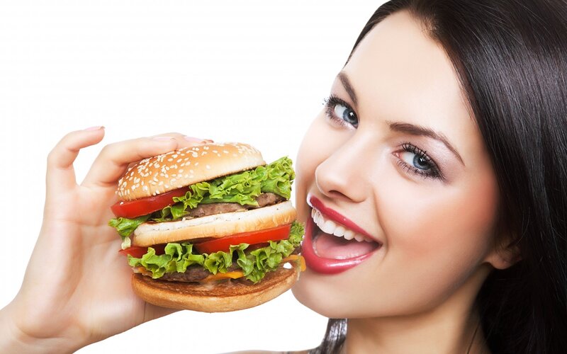 Woman Holding Hamburger — White