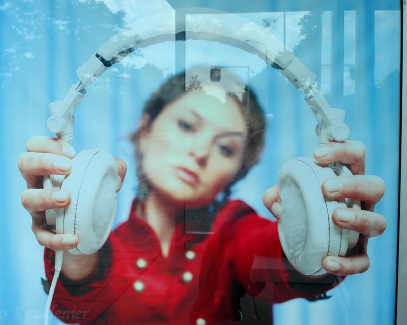 woman holding headphones