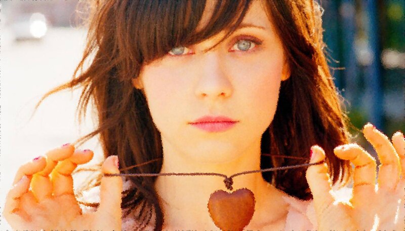 woman holding heart pendant