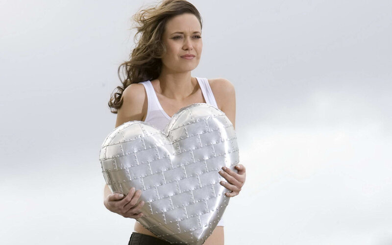 Woman Holding Heart — Silver