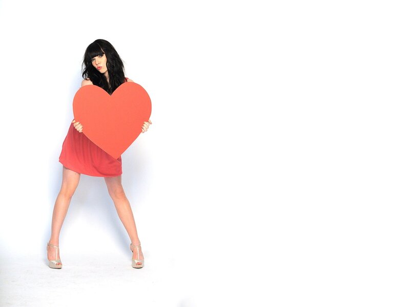 Woman Holding Heart — White, Playful