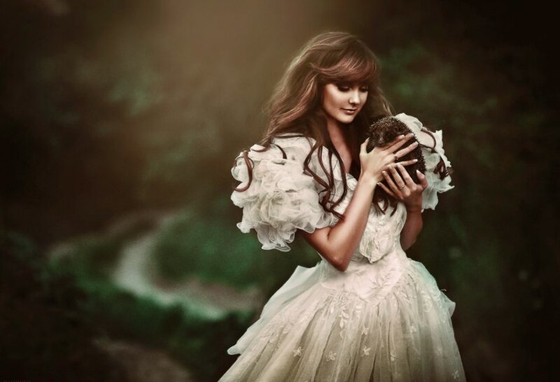 Woman Holding Hedgehog