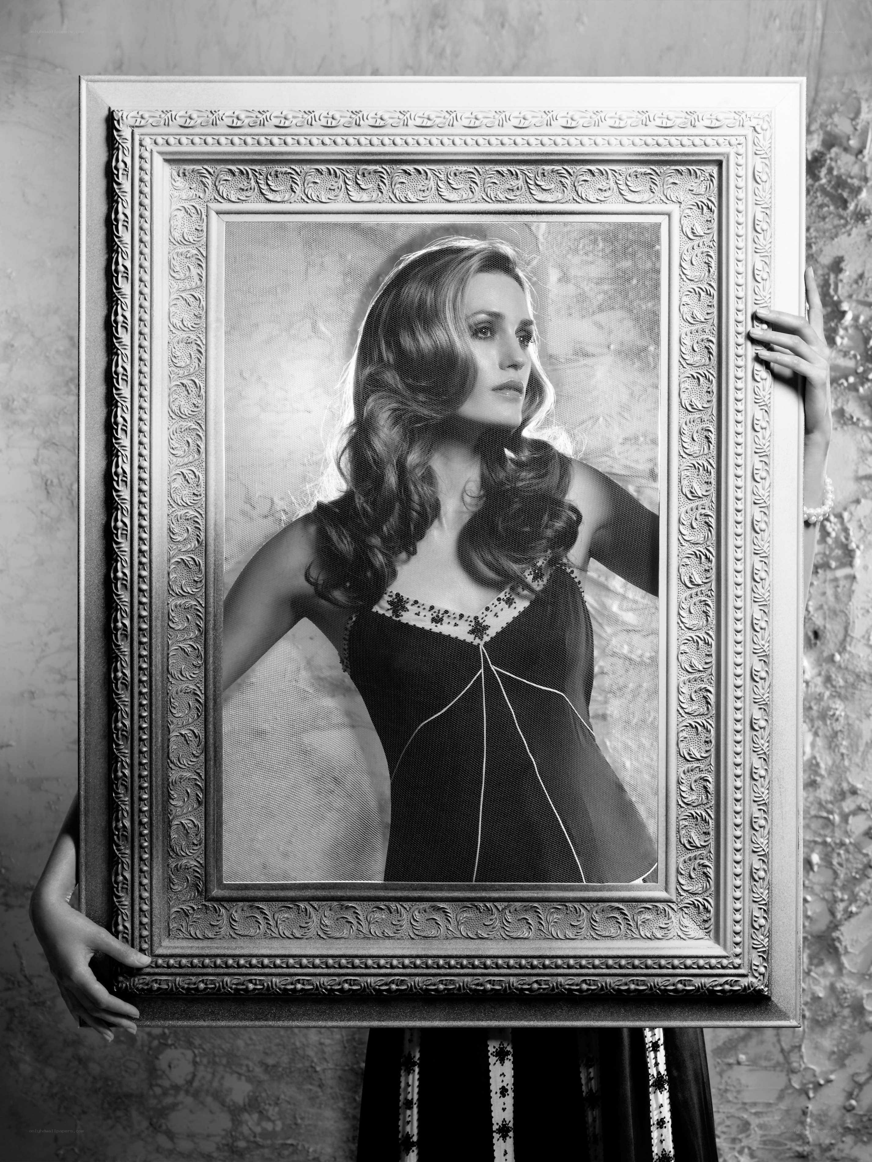 woman holding her portrait
