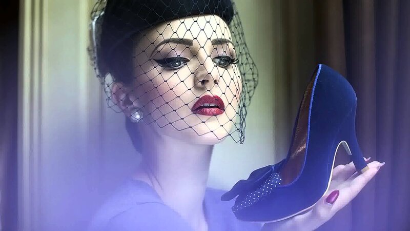 Woman Holding High Heel — Blue