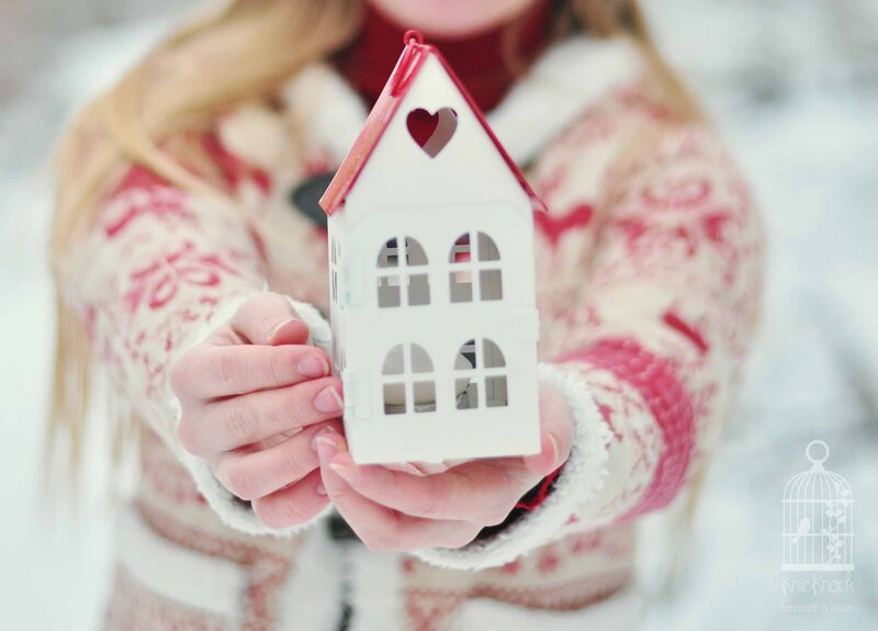 Woman Holding House Model