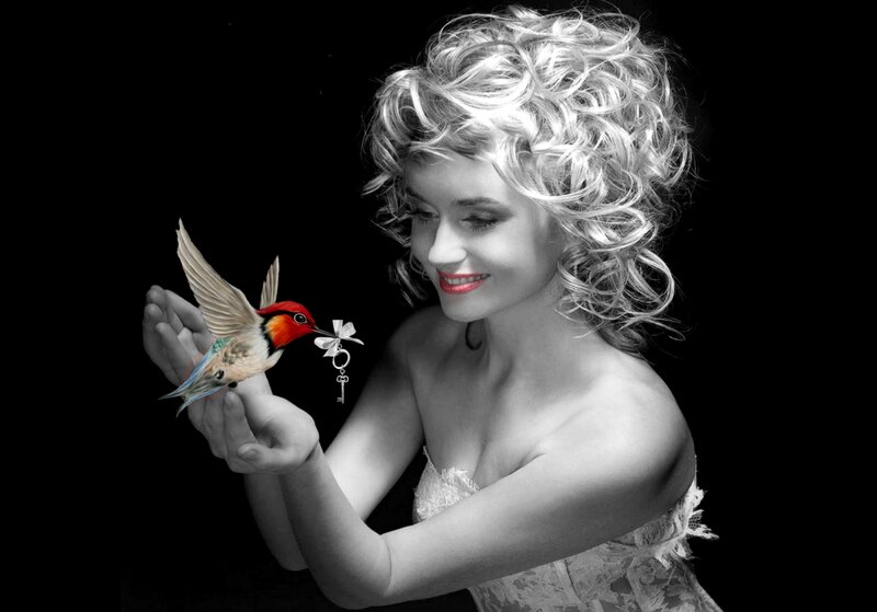 Woman Holding Hummingbird