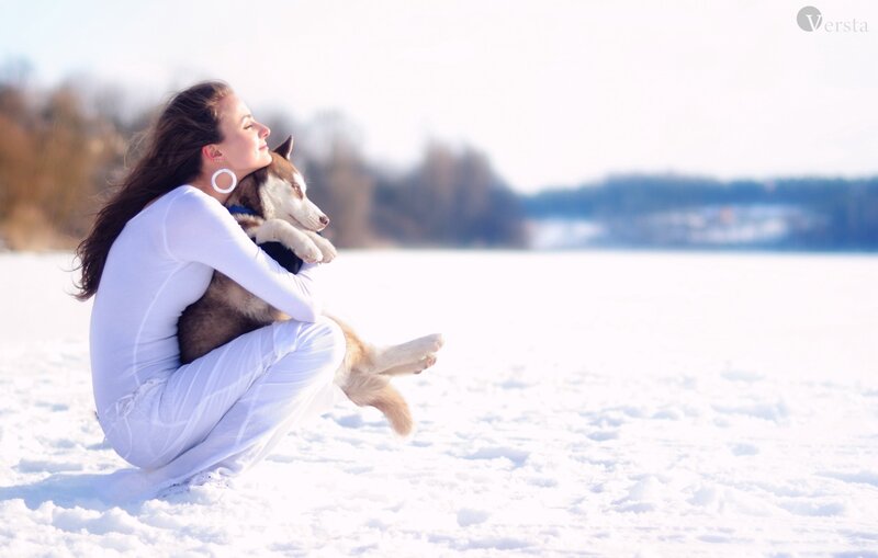 Woman Holding Husky
