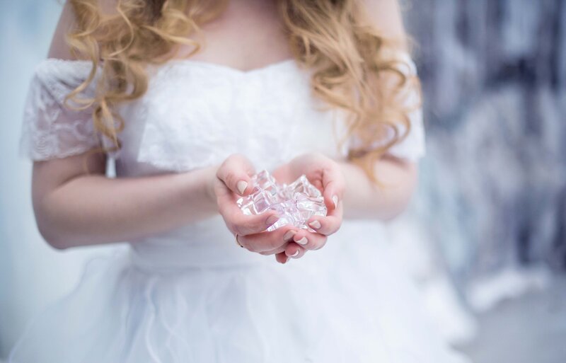 Woman Holding Ice Cubes