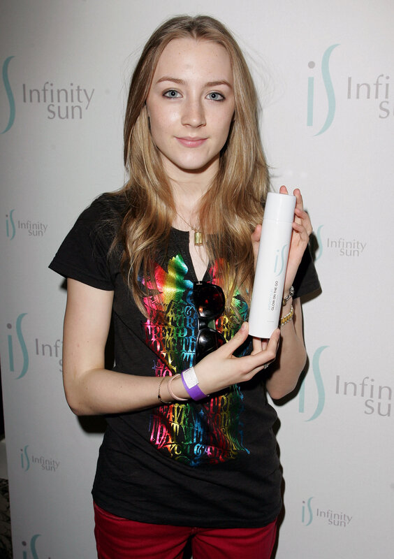 woman holding infinity sun product