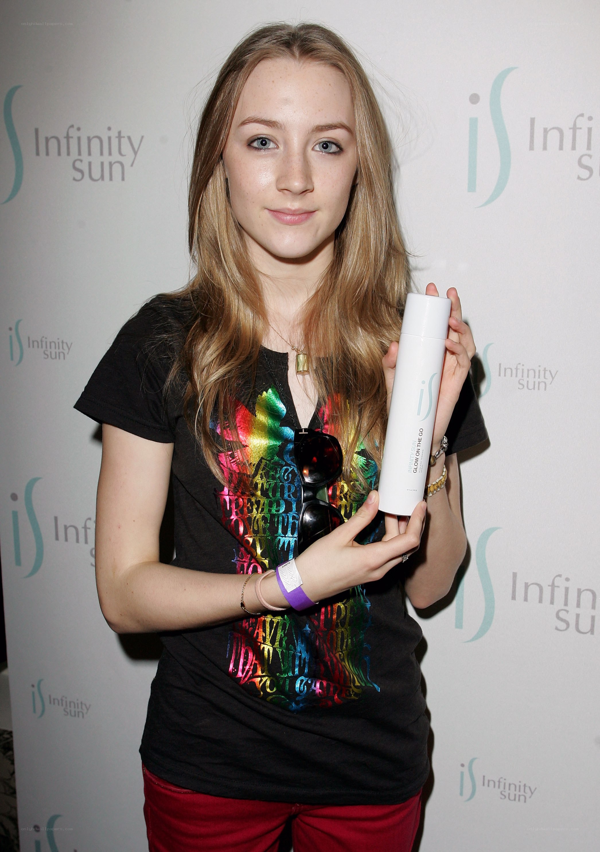 woman holding infinity sun product