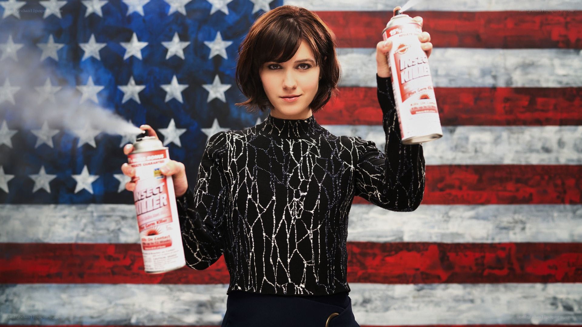 Woman holding insect spray cans