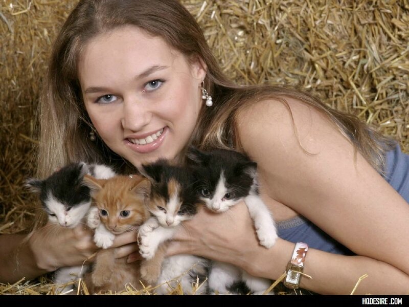 Woman Holding Kittens