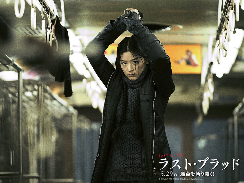 Woman Holding Knife — Black, Dramatic, Photograph