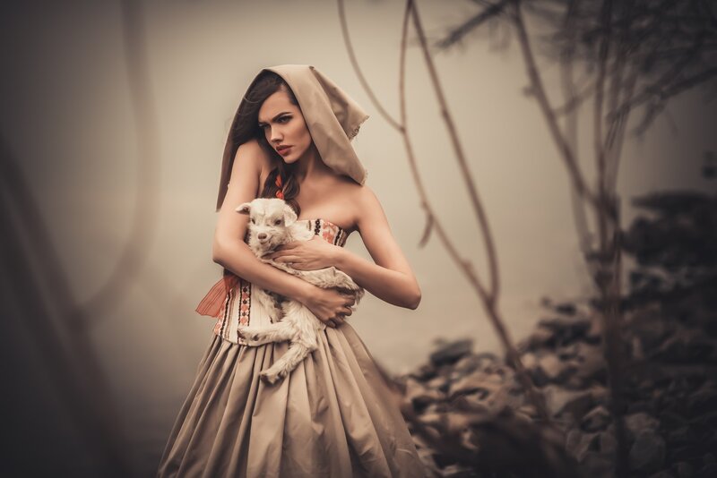 Woman Holding Lamb — Beige