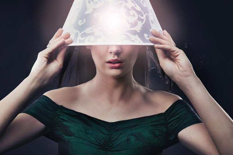 Woman Holding Lampshade