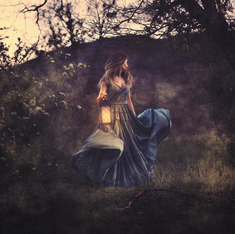 Woman Holding Lantern — Blue, Dramatic, Sunset