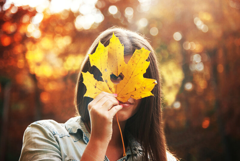 Woman Holding Leaf — Yellow, Playful