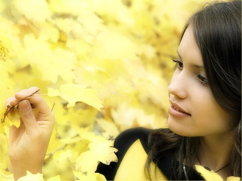 Woman Holding Leaf — Yellow