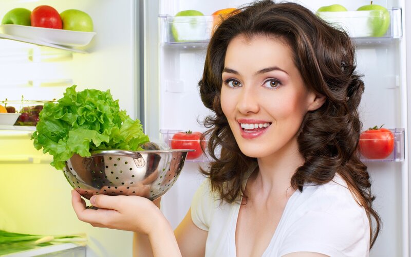Woman Holding Lettuce