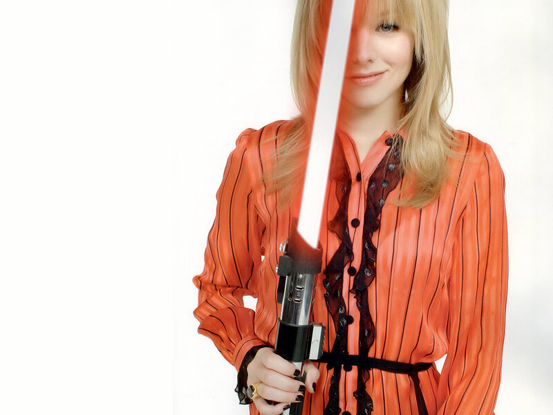 woman holding lightsaber