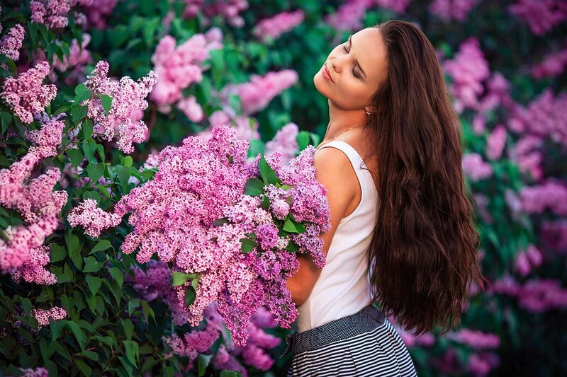 Woman Holding Lilac Bouquet