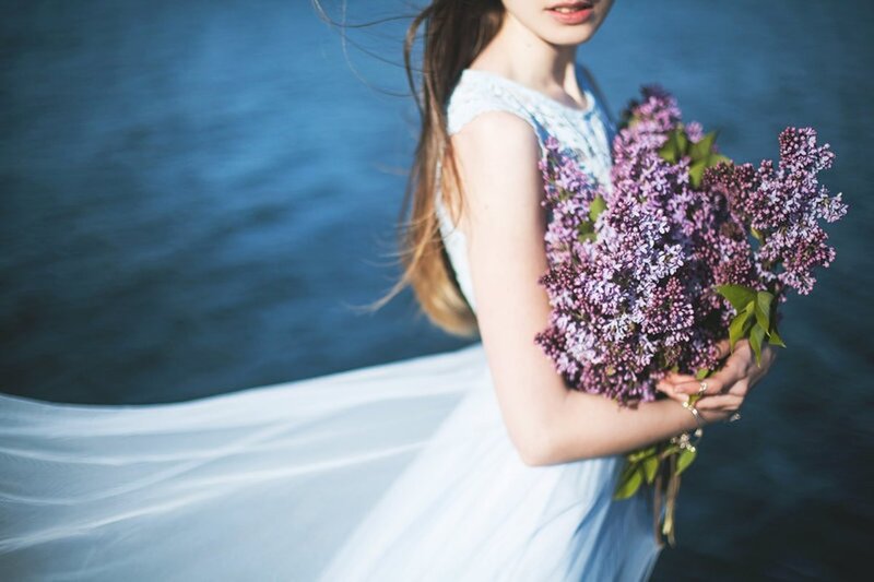 Woman Holding Lilacs — Blue
