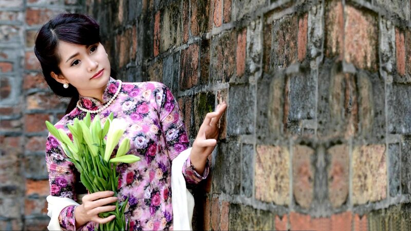 Woman Holding Lilies — Pink