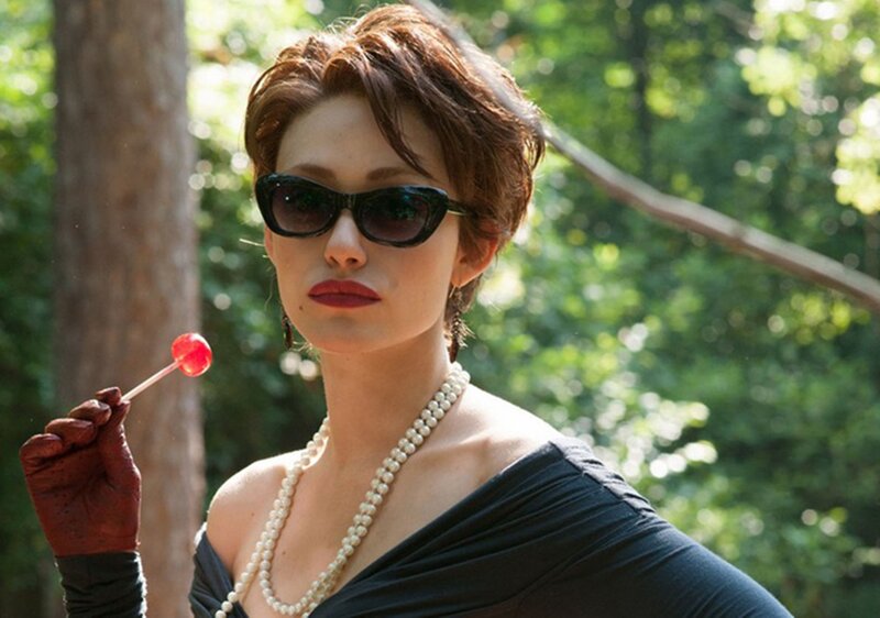 Woman Holding Lollipop — Black, Dramatic, Afternoon