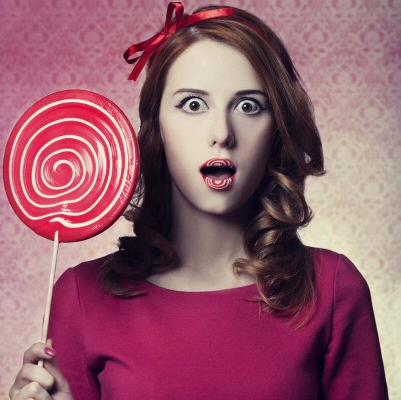 Woman Holding Lollipop — Red