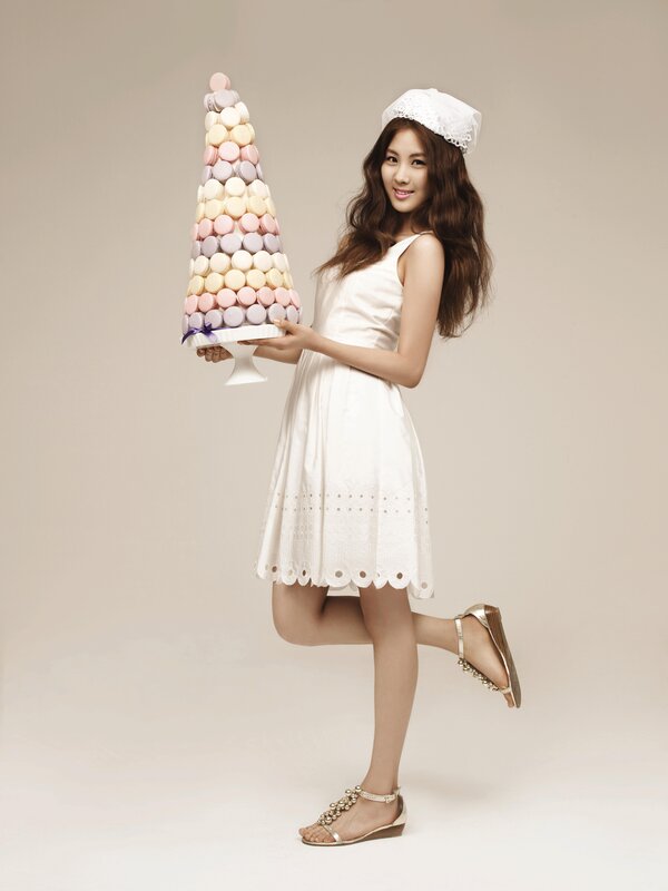 woman holding macaron tower