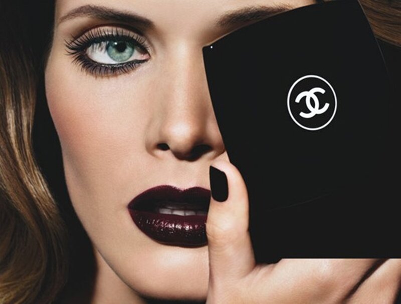 Woman Holding Makeup Compact