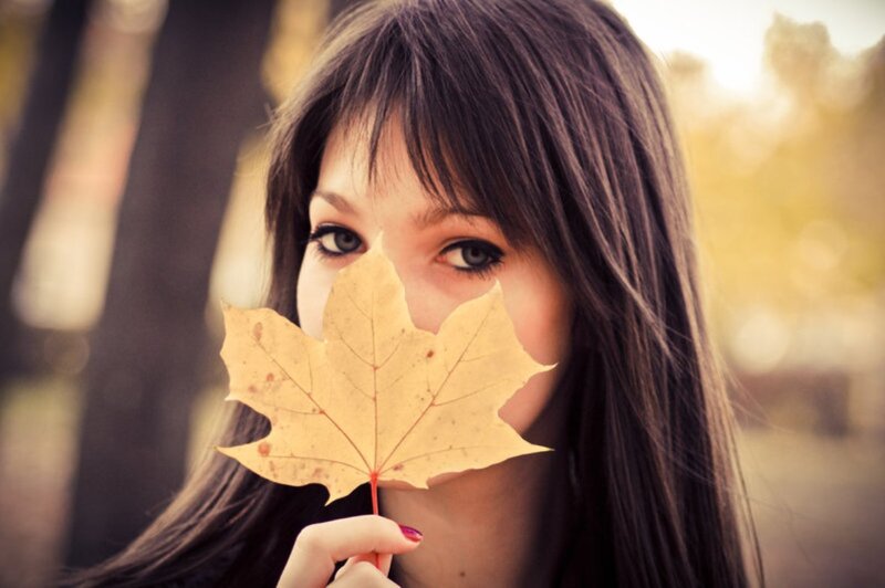 Woman Holding Maple Leaf
