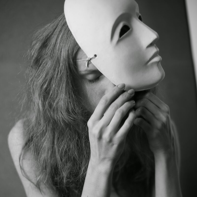 Woman Holding Mask — Black, Dramatic, Photograph, Hands