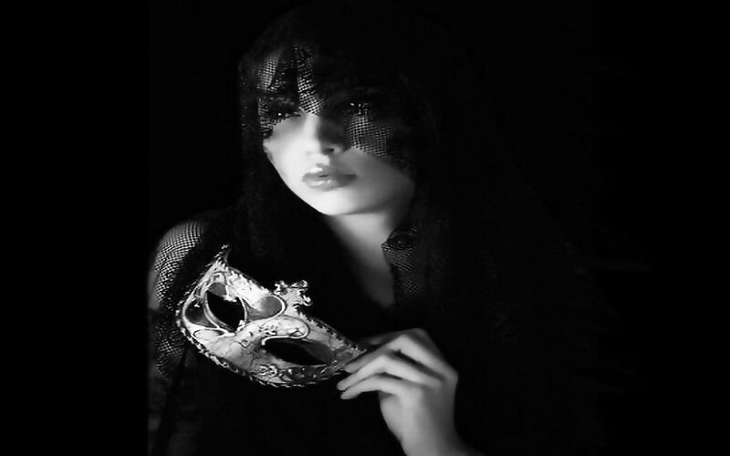 Woman Holding Mask — Black, Dramatic