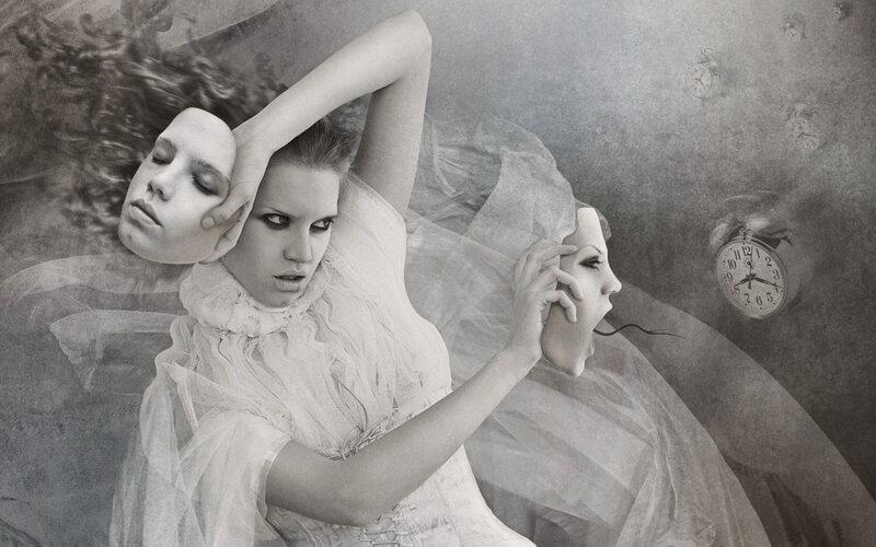 Woman Holding Masks