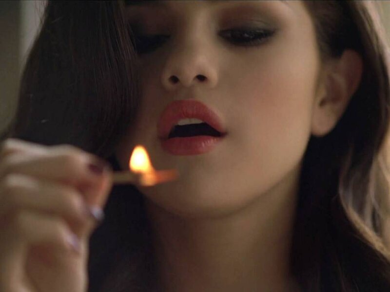 Woman Holding Match