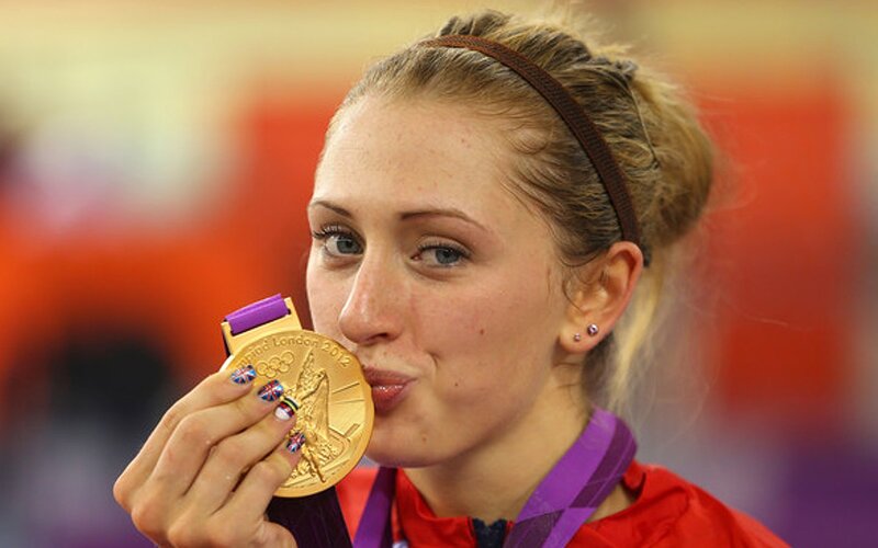 Woman Holding Medal