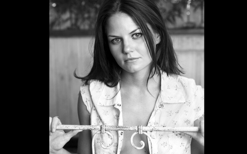 woman holding metal bar