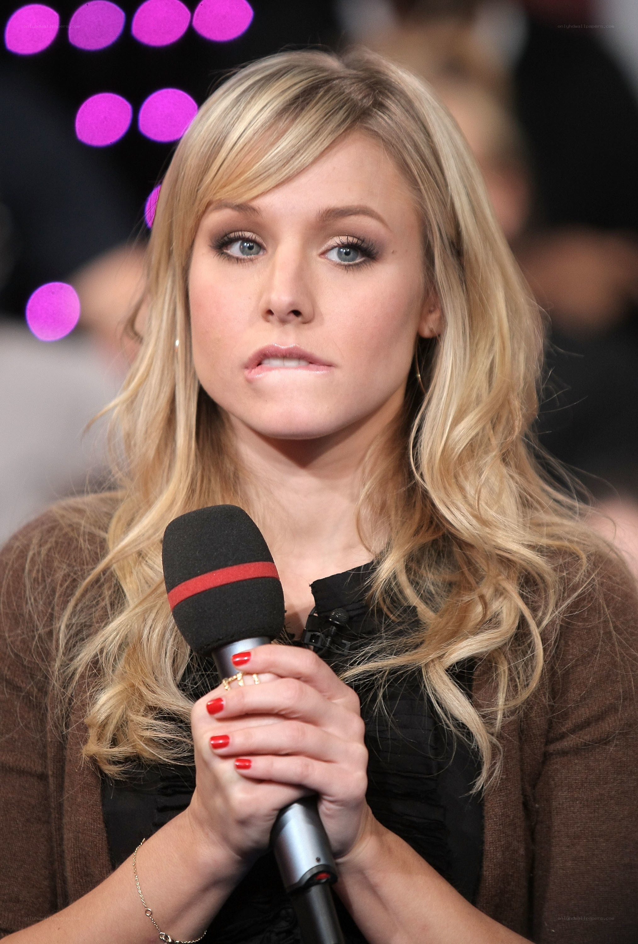 woman holding microphone