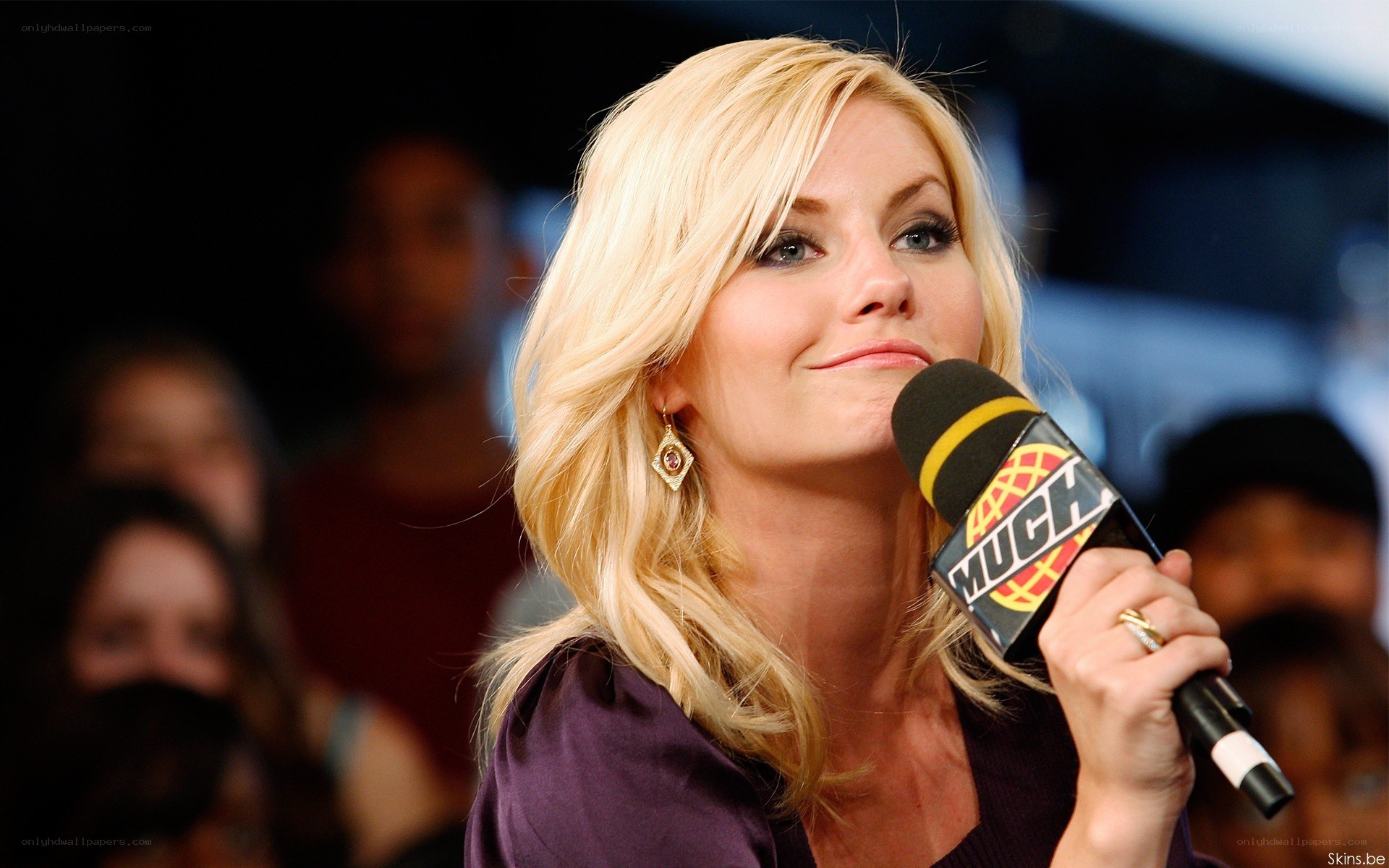 woman holding microphone