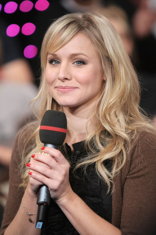 woman holding microphone