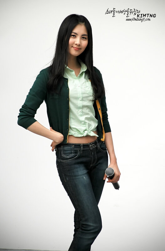 woman holding microphone