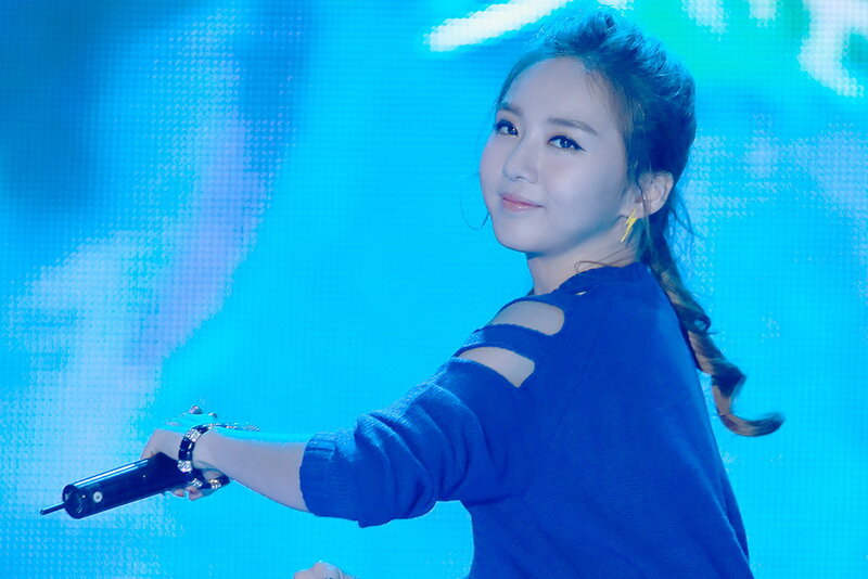 Woman Holding Microphone — Blue