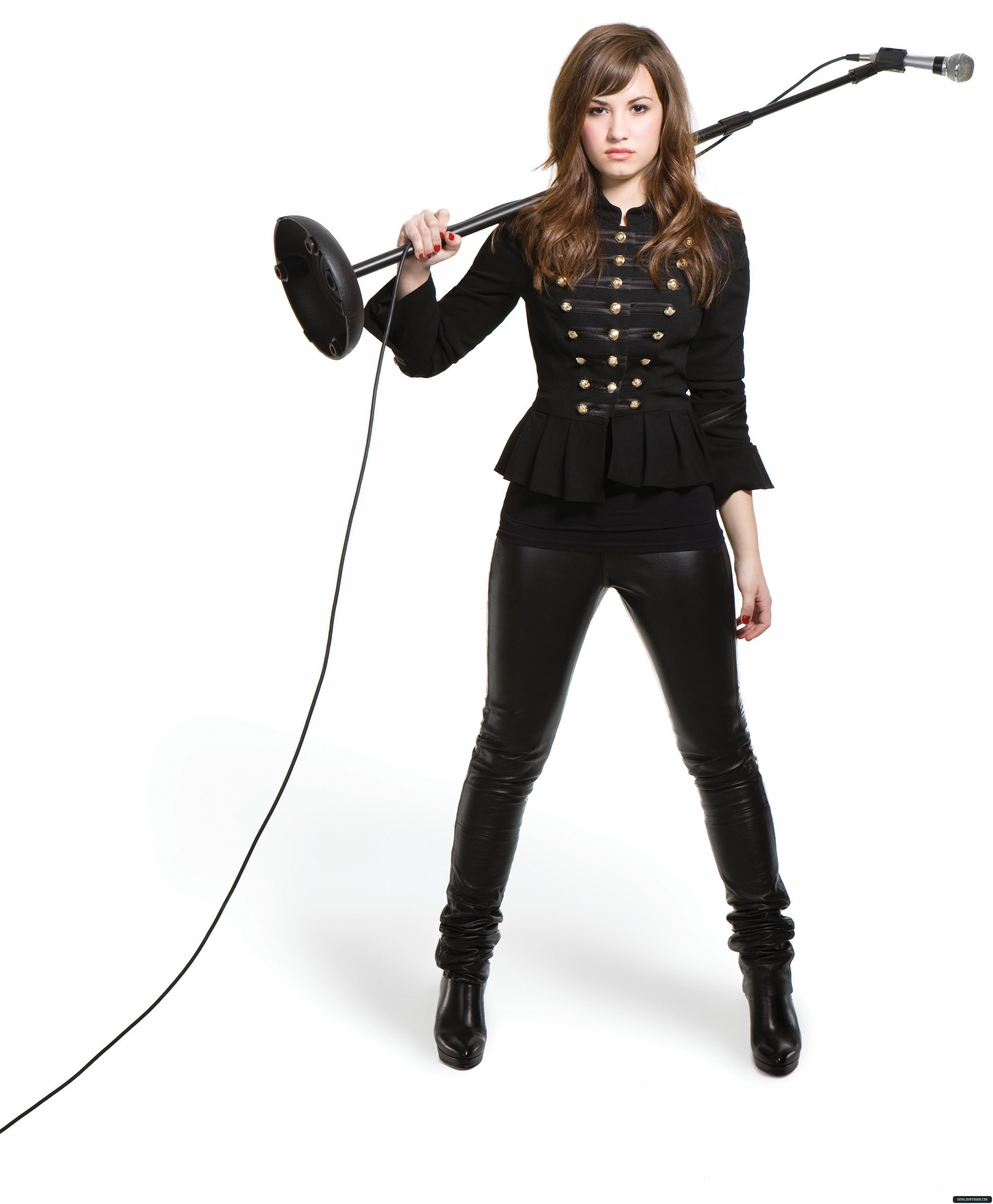 woman holding microphone stand